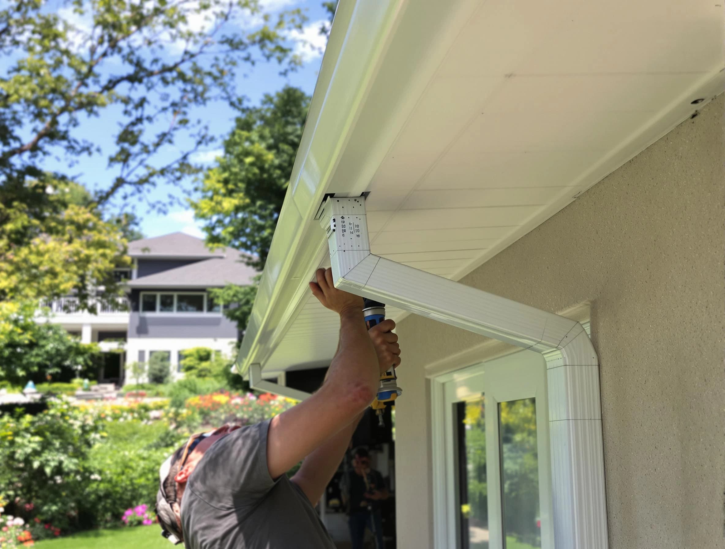 North Olmsted Roofing Company technicians performing gutter installation in North Olmsted, OH